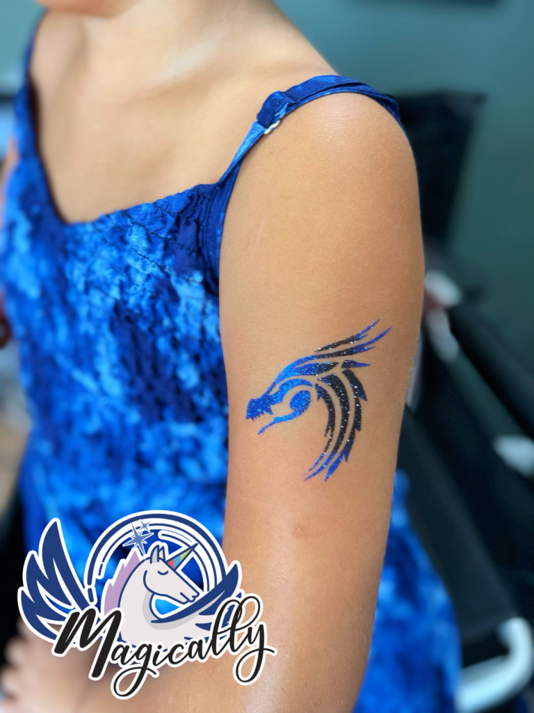 Glitter Tattoo of a detailed dragon design, featuring shimmering sparkles and vibrant colors for a magical look